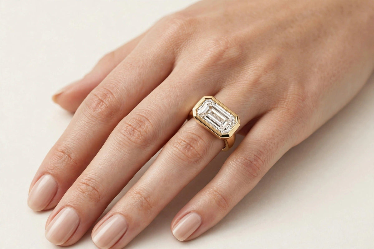 East-West Bezel Emerald Ring lifestyle