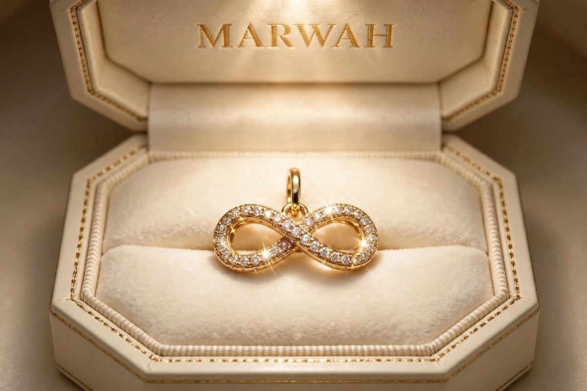 Anniversary Infinity Charm in the MARWAH ivory box