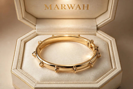Signature Charm Bangle in the MARWAH ivory box