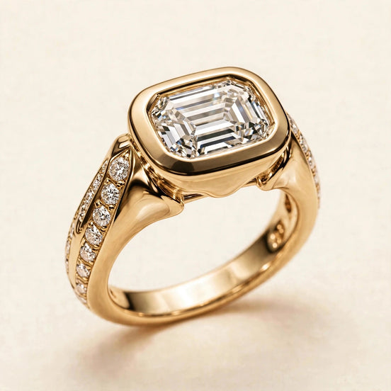 East-West Bezel Emerald Ring