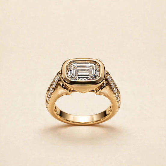 East-West Bezel Emerald Ring