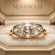 East-West Oval Solitaire Engagement Ring in the MARWAH ivory box