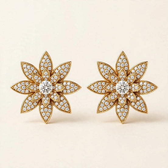 Floral Cluster Studs, pavé diamond petals around a round diamond center in yellow gold, pair front view.
