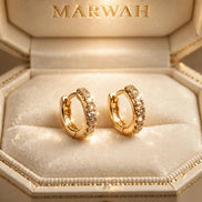 Diamond Huggie Hoops in the MARWAH ivory box