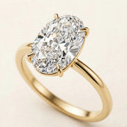 Oval Solitaire Ring, elongated oval lab-grown diamond in a four-prong setting on a plain band in yellow gold, three-quarter detail view.