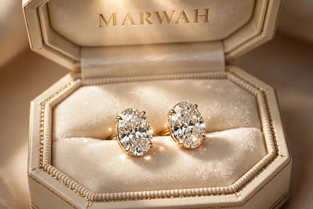 Oval Diamond Studs in the MARWAH ivory box