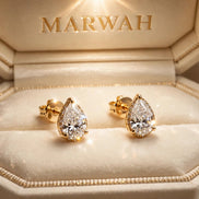 Pear Diamond Studs in the MARWAH ivory box