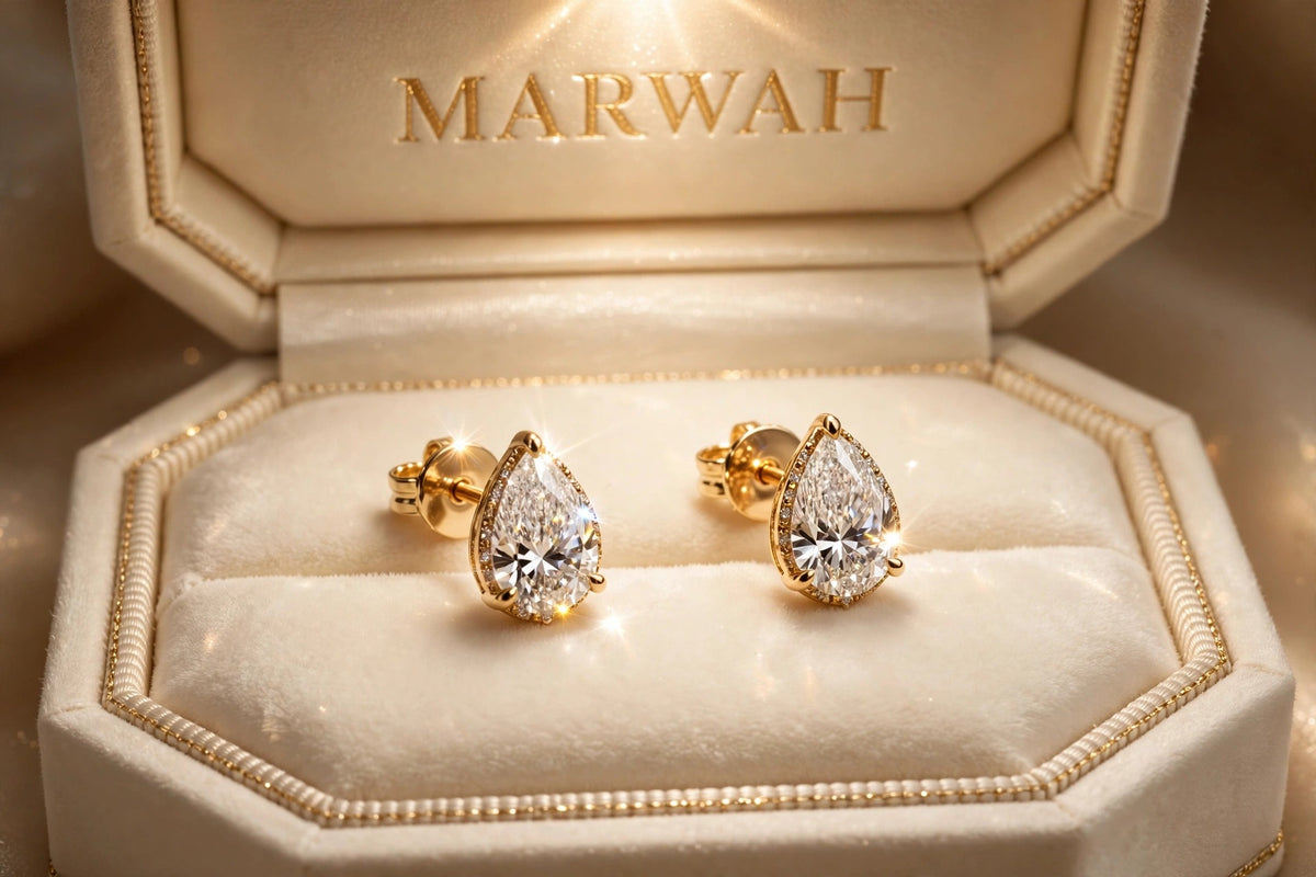 Pear Diamond Studs in the MARWAH ivory box