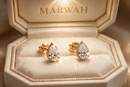 Pear Diamond Studs in the MARWAH ivory box