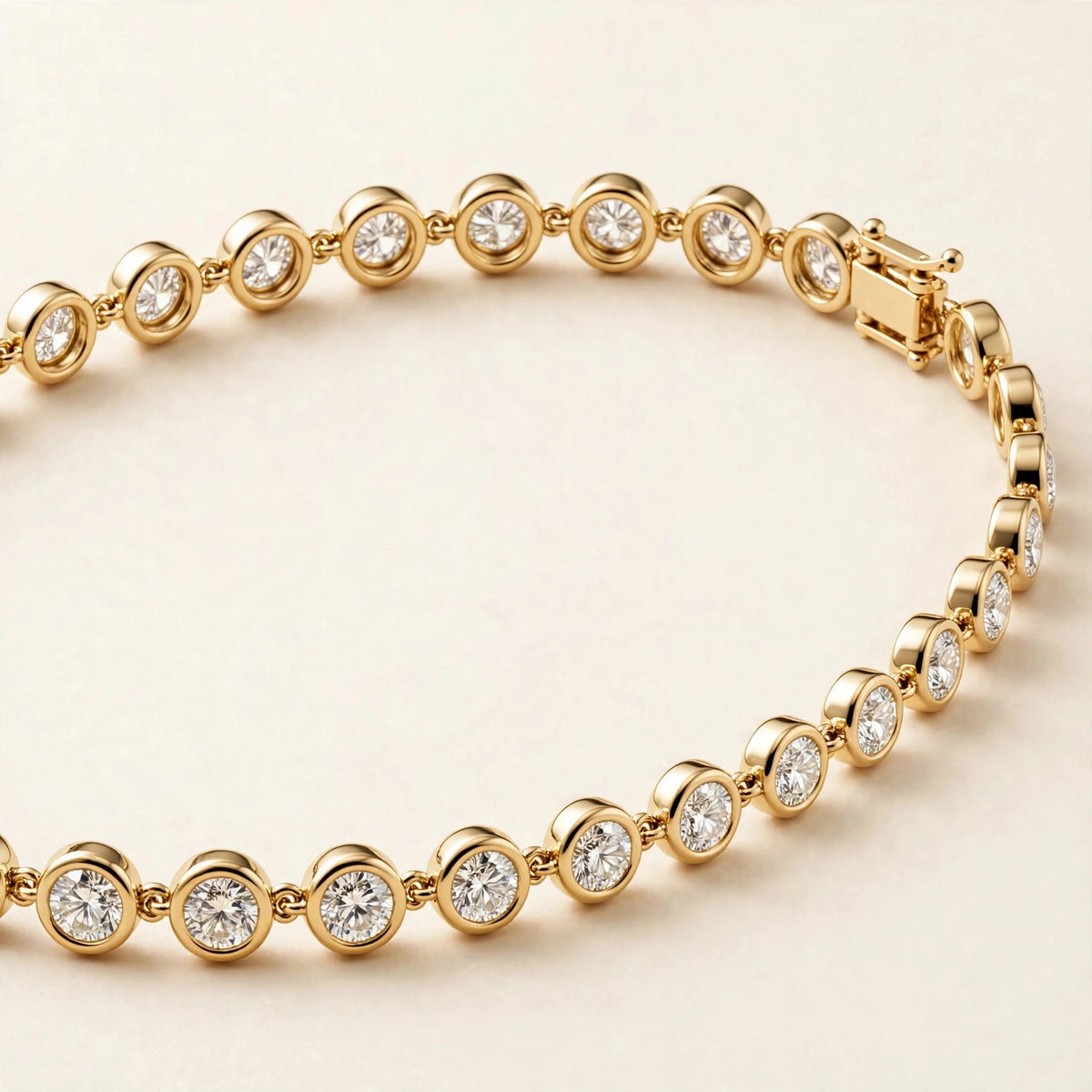 Slim Bezel-Set Diamond Bracelet, round diamonds in slim bezel settings in yellow gold, three-quarter detail view.