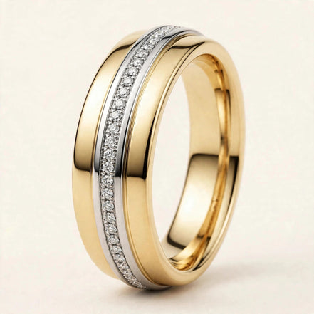 Two-Tone Diamond Band, pavé round diamonds set in a white gold rail on a yellow gold band, three-quarter detail view.