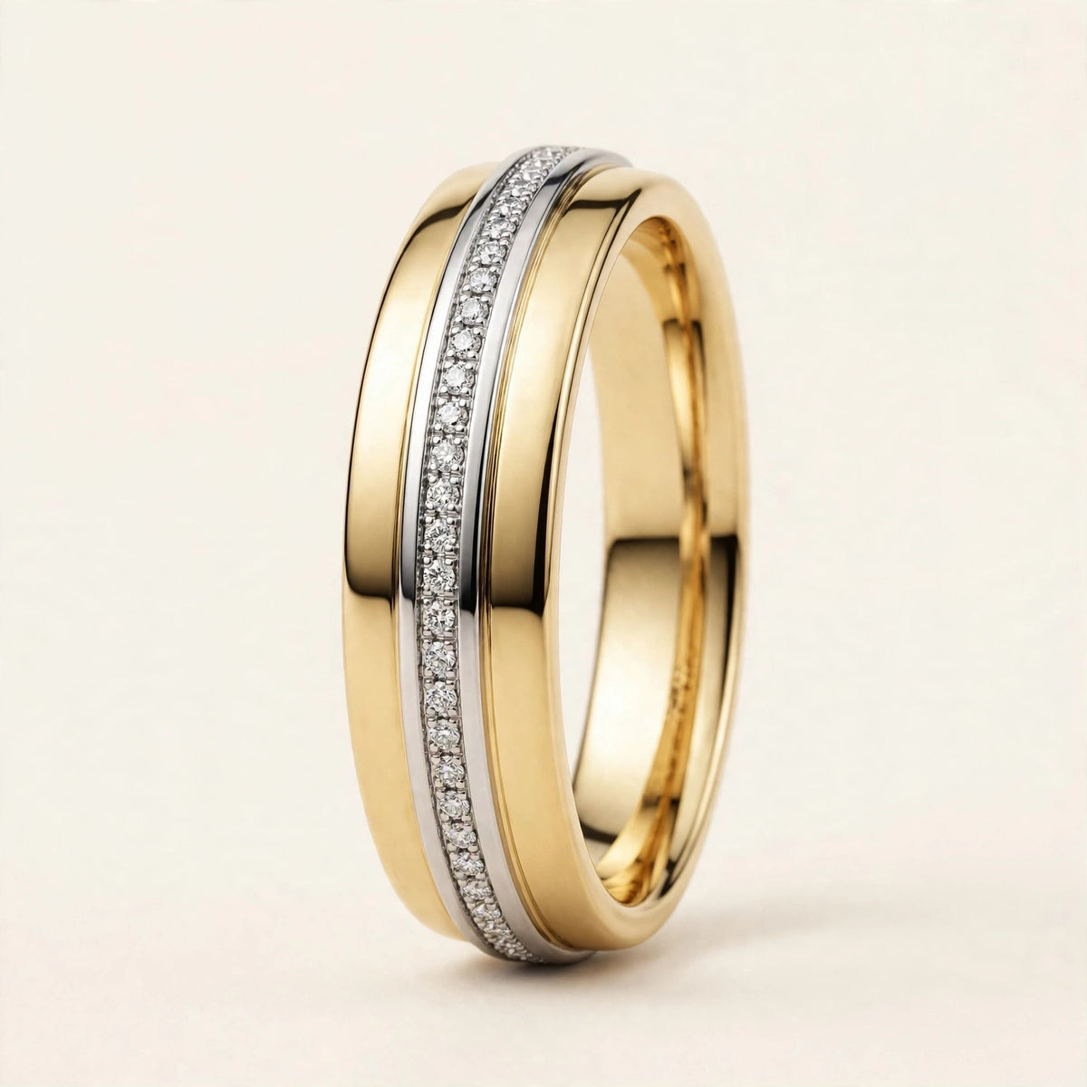 Two-Tone Diamond Band, pavé round diamonds set in a white gold rail on a yellow gold band, front view.