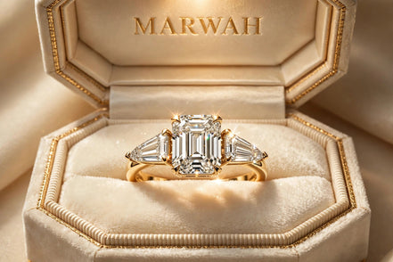 Emerald-Cut Three-Stone Engagement Ring in the MARWAH ivory box